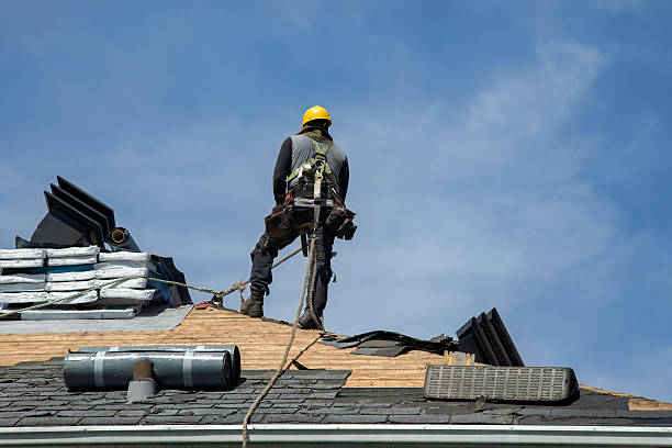Professional Storm Damage Roof Repair technician working in Douglas, MA